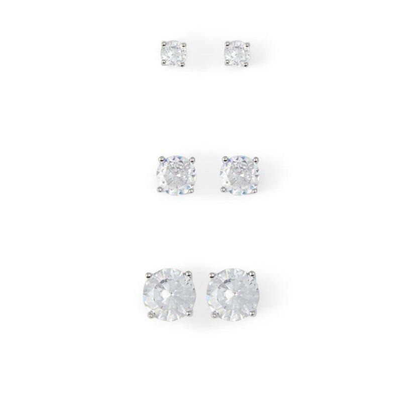 Three pairs of silver stud earrings with clear round stones in graduated sizes
