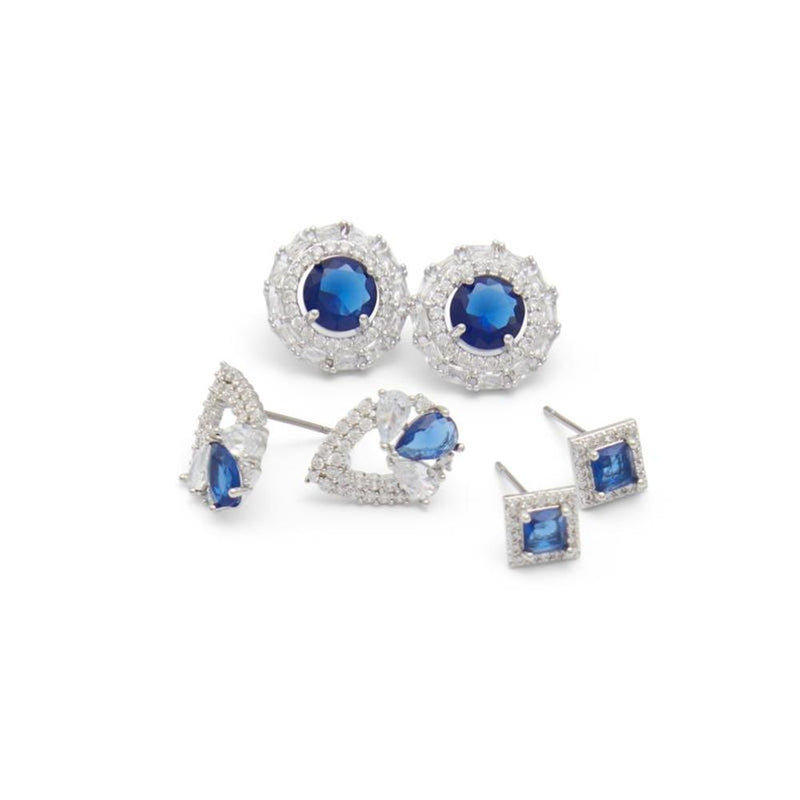 Set of silver-tone stud earrings with blue and clear crystal stones in round, teardrop, and square shapes