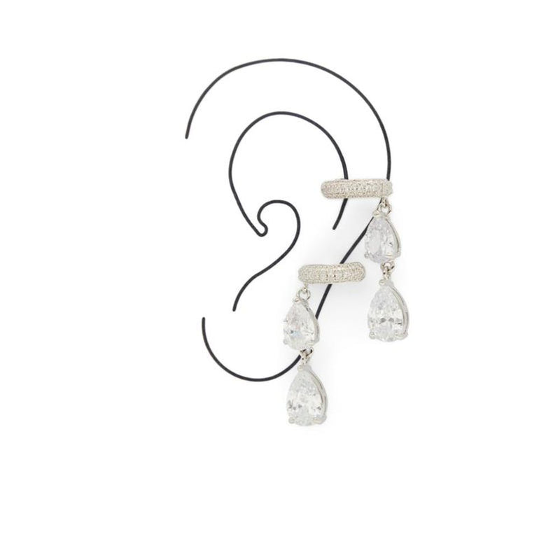 Silver pavé huggie earrings with dangling teardrop crystals on a wire ear form