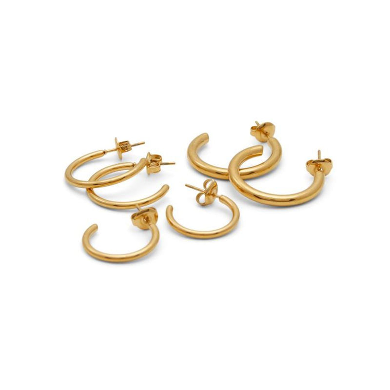 Set of glossy gold hoop earrings in varying sizes with post-back closures