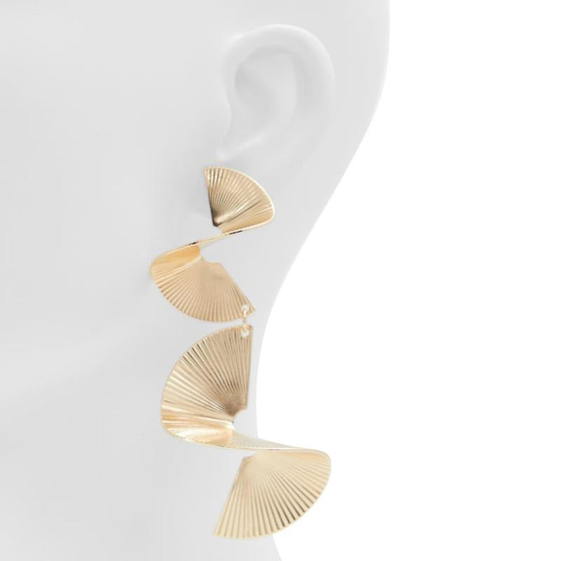 Gold metal drop earrings featuring a long, cascading accordion-pleated spiral design on a mannequin ear