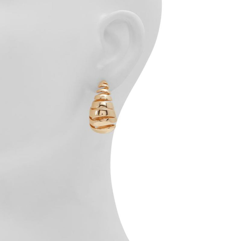 Glossy gold-toned metal spiral drop earrings worn on a mannequin ear