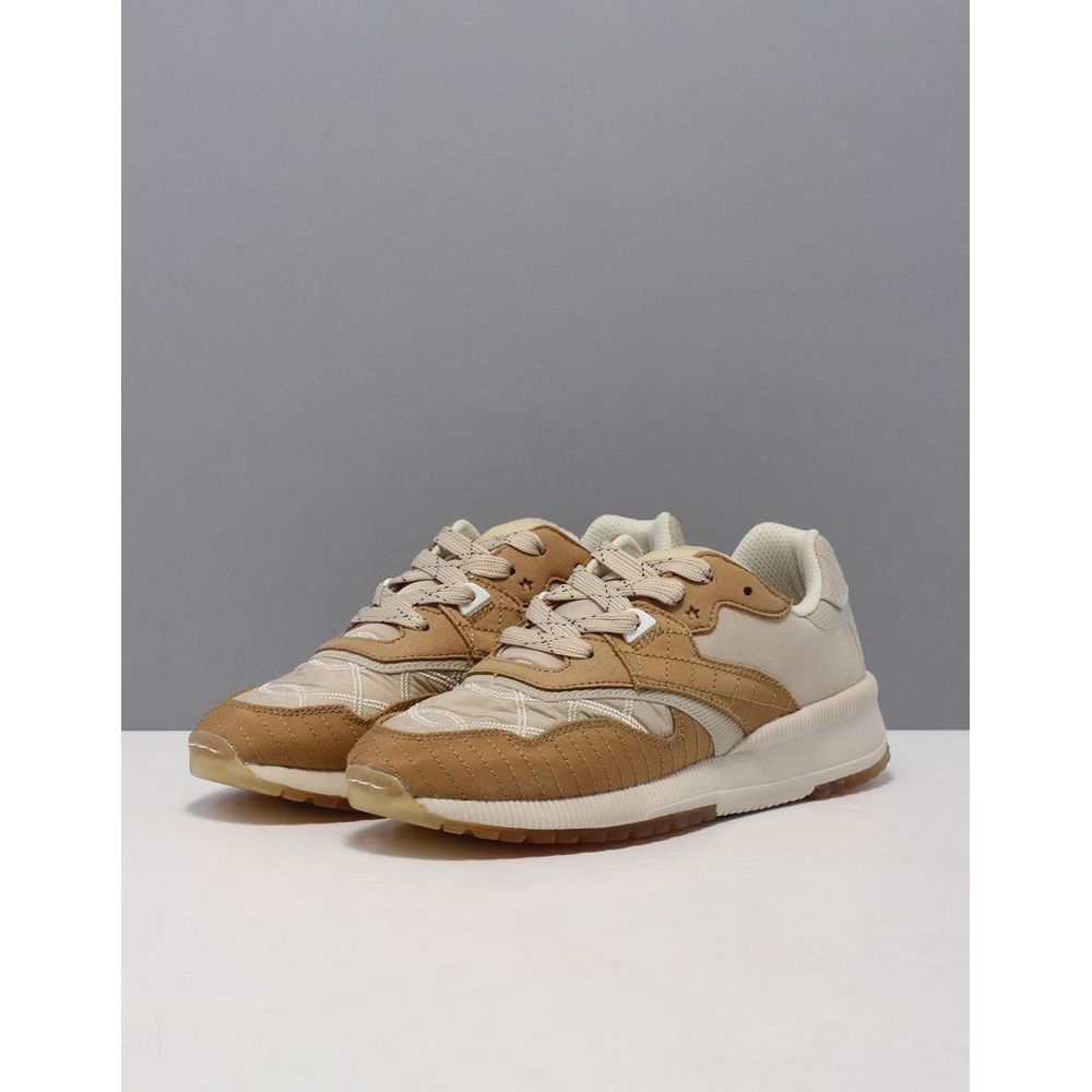 Scotch & Soda beige nylon low-top sneakers featuring quilted details, suede overlays, and a thick white rubber sole.