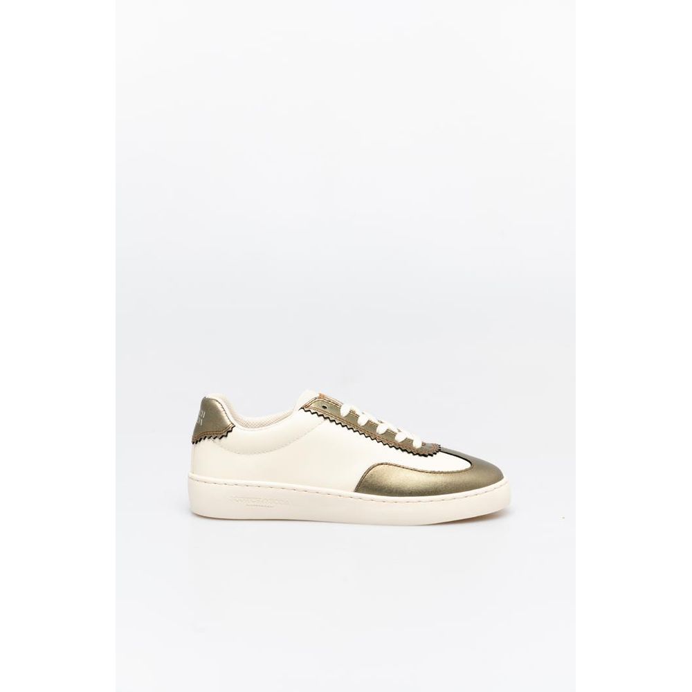 Scotch & Soda low-top sneakers in off-white and bronze leather with serrated edge detailing and white laces.