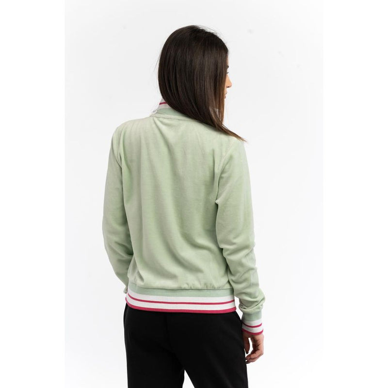 Light green cotton zip-up sweatshirt with white and pink striped ribbed trim worn from behind