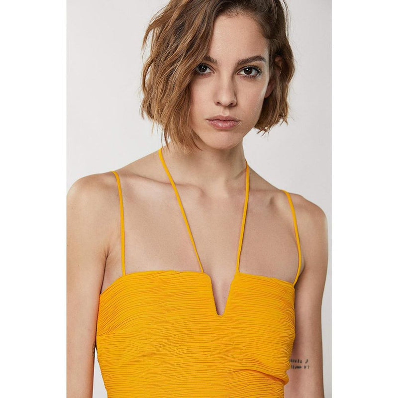 Bright orange polyester casual dress with spaghetti straps and a v-neckline