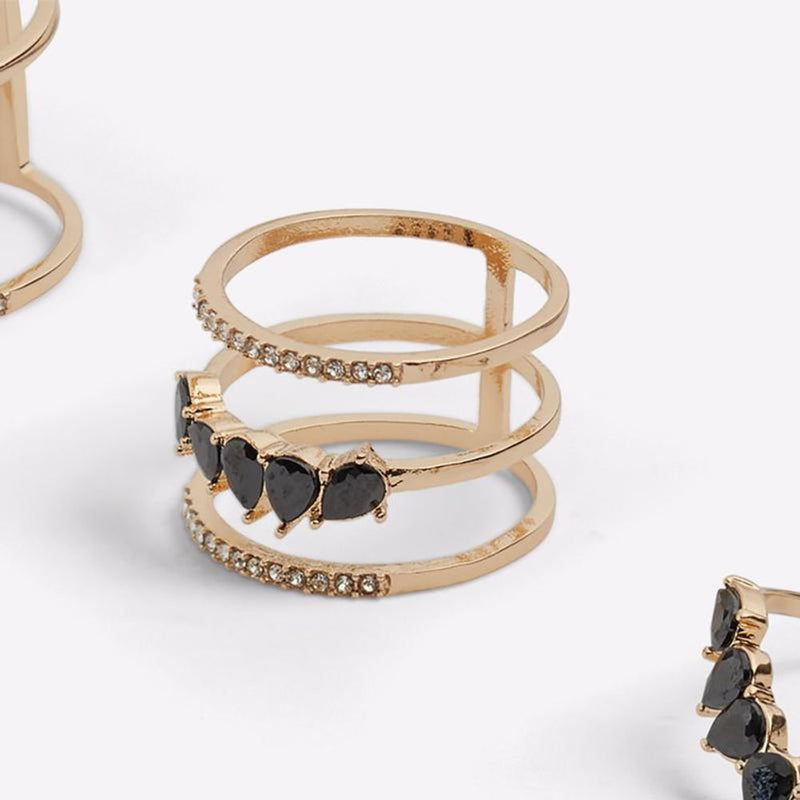 Gold metal multi-band ring with black heart gems and clear crystal accents