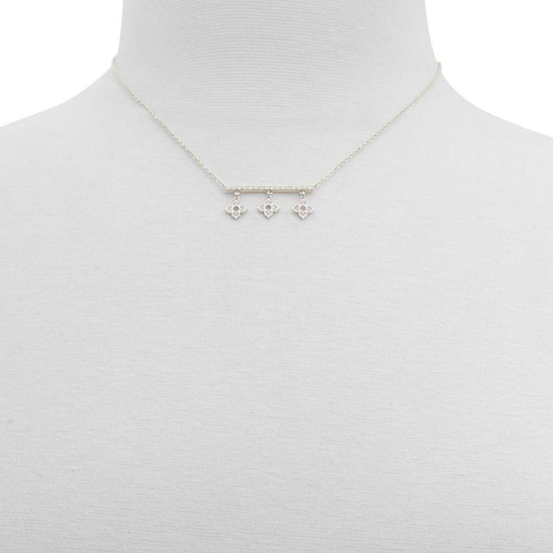 Silver chain necklace with a horizontal bar pendant and three small flower charms