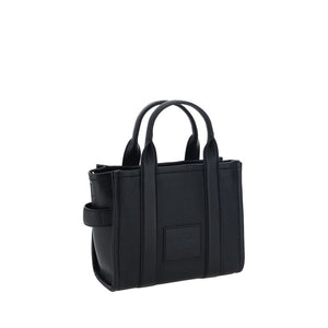 Marc Jacobs black calf leather handbag with dual top handles and a square logo patch on the front.