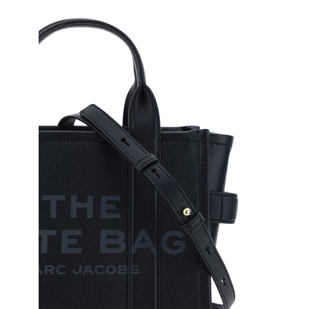 Marc Jacobs black calf leather handbag with top handles and adjustable strap.