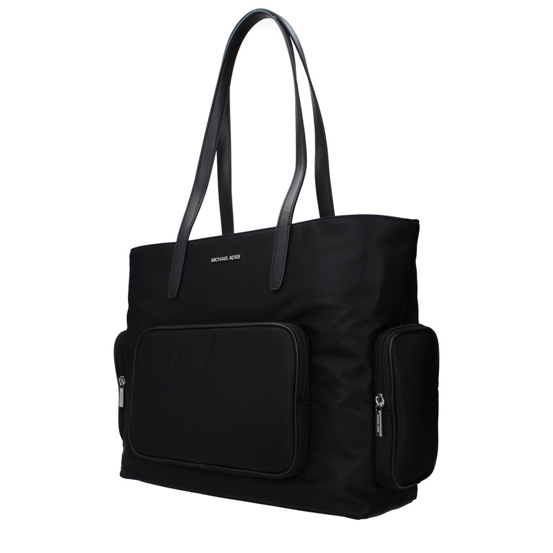 Black nylon Michael Kors shoulder bag with long dual straps and front zippered pockets
