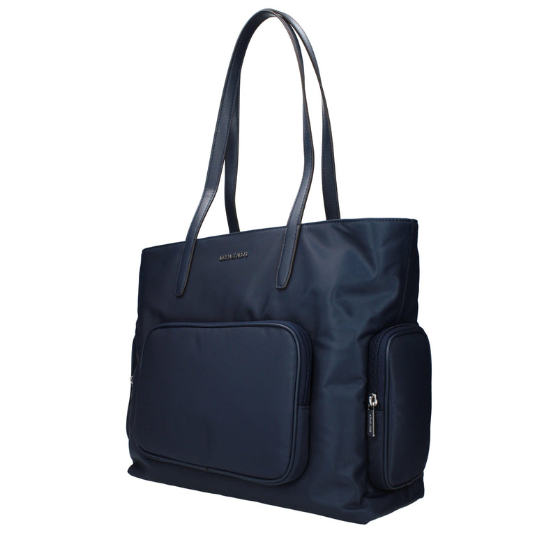 Dark blue nylon shoulder bag with thin straps and a front pocket