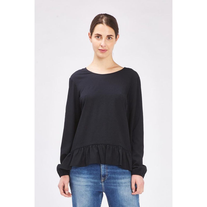 Black polyester long sleeve t-shirt with a ruffled hem worn by a woman
