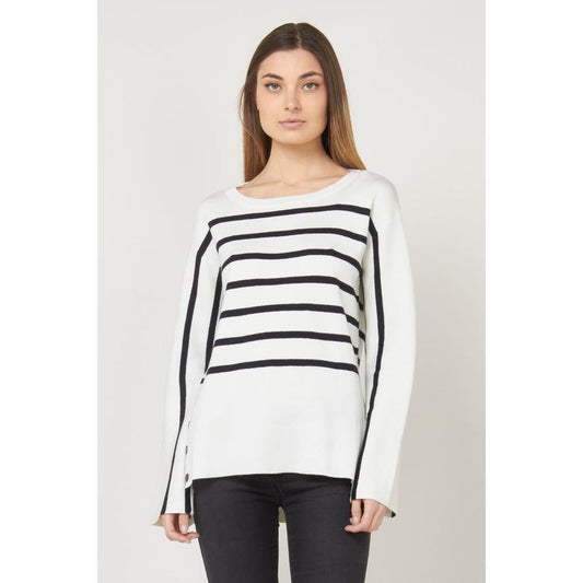 White wool sweatshirt with black horizontal stripes and long sleeves worn by a model