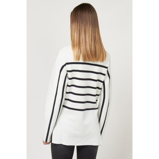 White wool long-sleeve sweatshirt with black stripes worn by a person viewed from behind