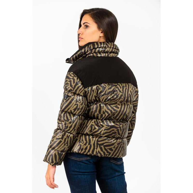 Gas green polyamide puffer parka with black abstract print and high collar worn by a woman