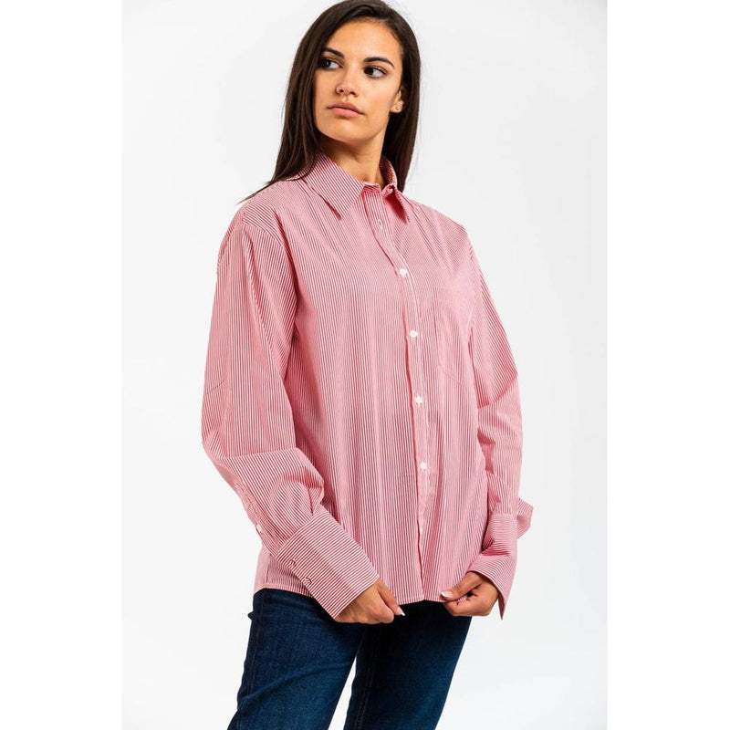 Red and white striped cotton long-sleeve button-down shirt worn by a woman