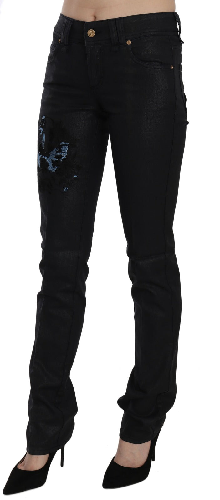 Black mid-rise skinny denim jeans with blue embroidered floral design on the right thigh