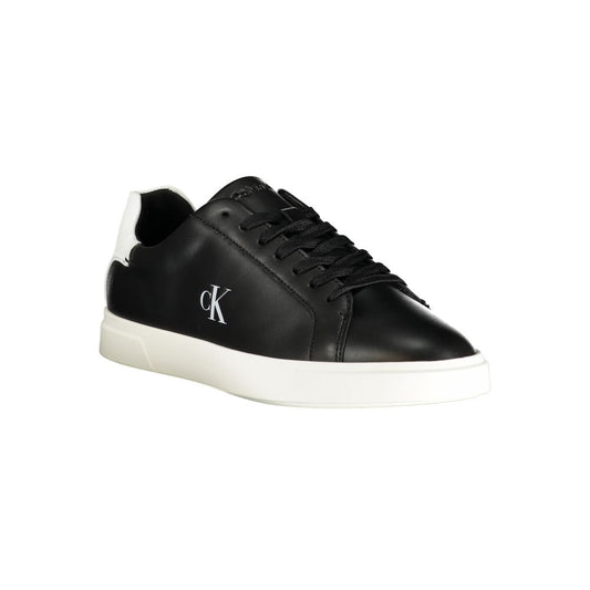 Calvin Klein women’s black polyurethane low-top sneaker with a white logo, white heel tab, and white rubber sole.
