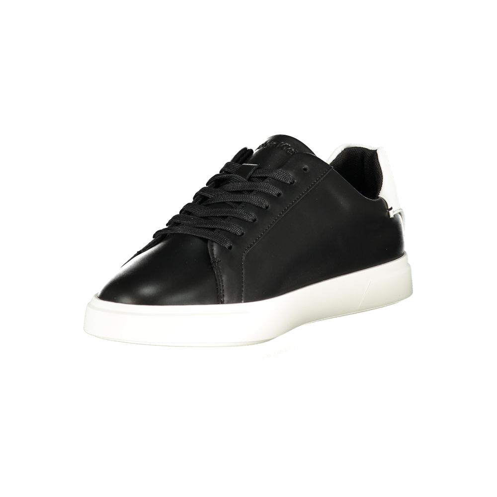 Calvin Klein black polyurethane women's sneaker with lace-up front, white heel tab, and white rubber sole.