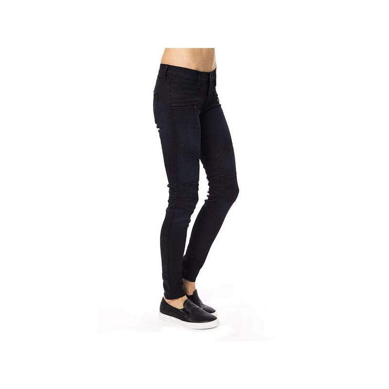 Gas blue cotton skinny pants with zipped pockets and paneled knees worn by a model