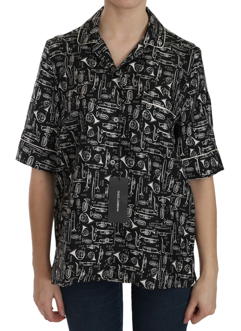 Black silk short-sleeve button-up top with white musical instrument print