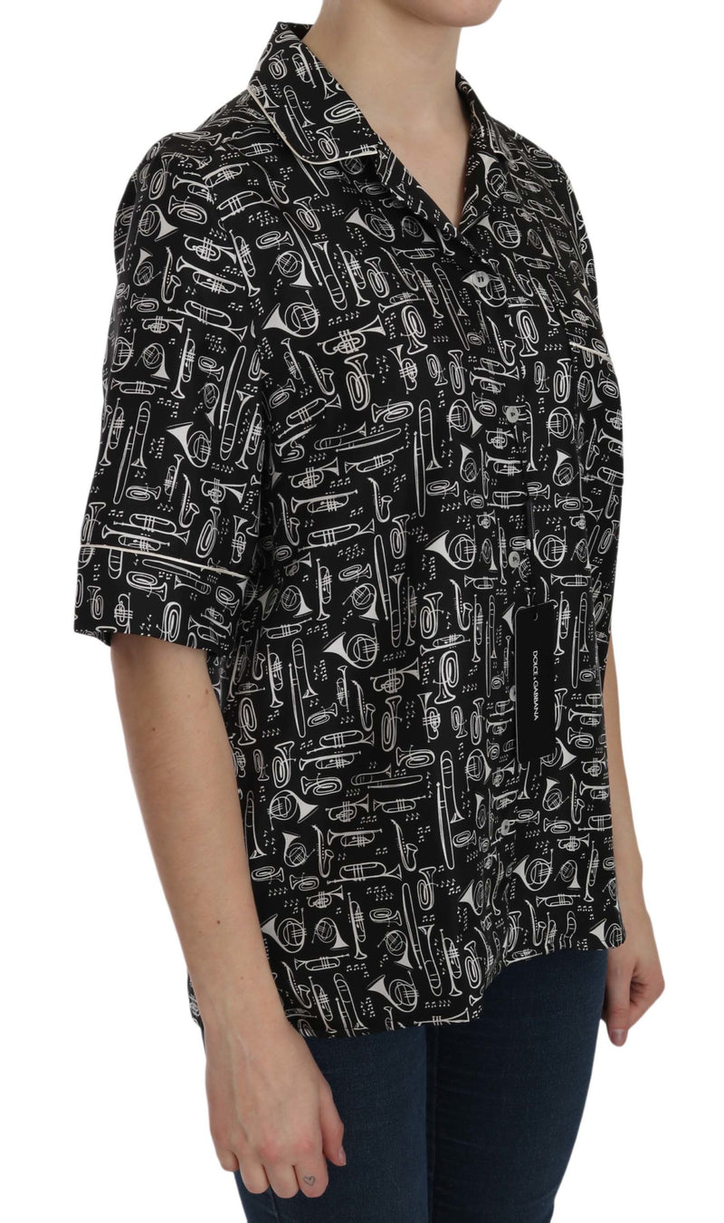 Black silk short-sleeve button-down top with white musical instrument print