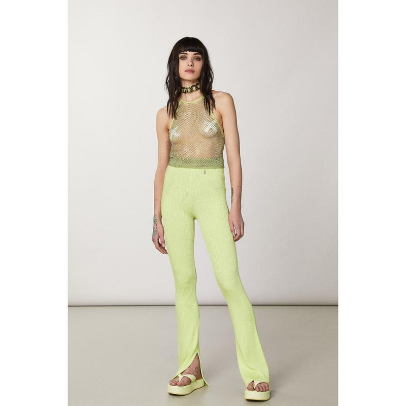 Bright yellow ribbed viscose casual pants worn by a model