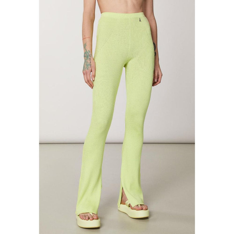 Bright yellow ribbed viscose casual pants worn by a model