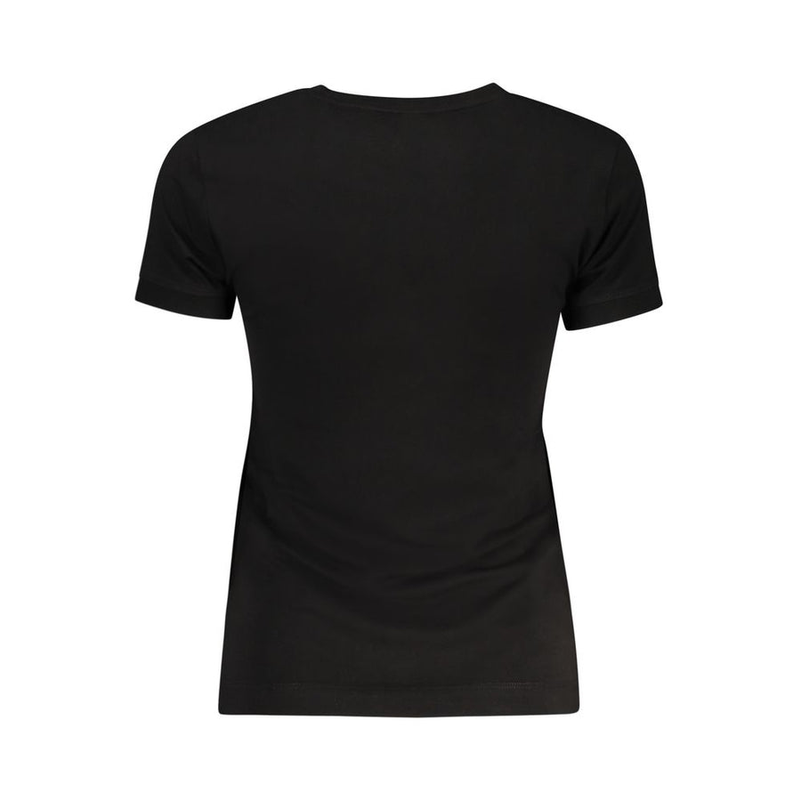 Black organic cotton women's t-shirt with short sleeves and a small red Guess logo on the chest