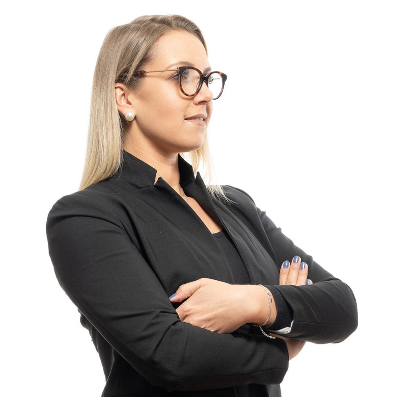 Sandro brown tortoise-shell and metal glasses frames worn by a woman
