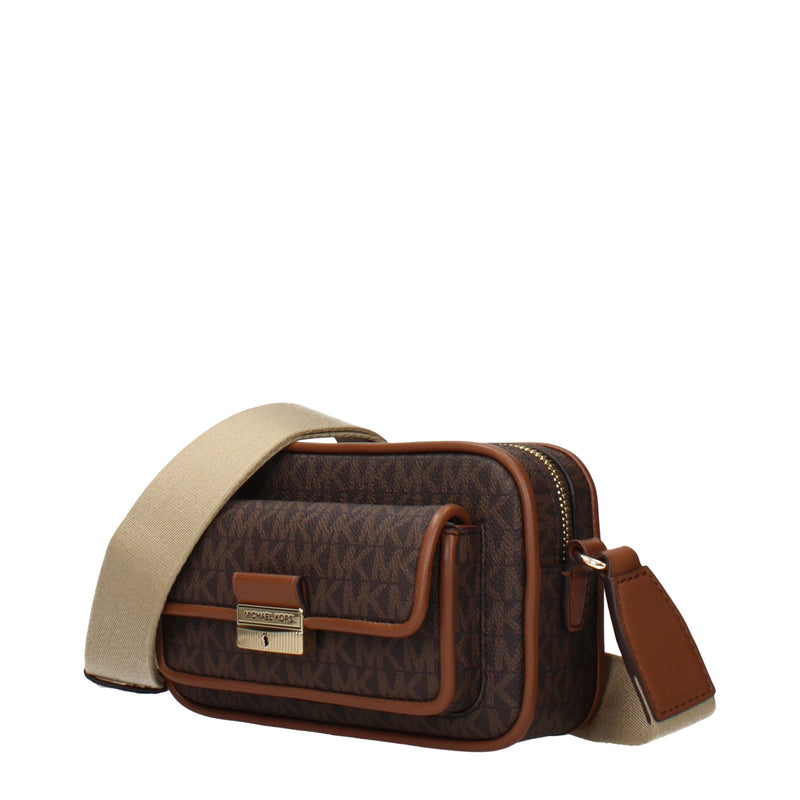 Brown Michael Kors monogram canvas crossbody bag with a beige strap