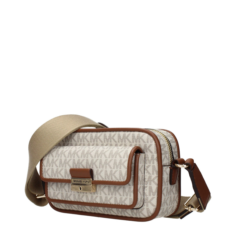 Beige canvas Michael Kors monogram crossbody bag with brown leather trim and a wide strap