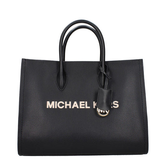 Black leather tote bag with top handles and prominent Michael Kors lettering on the front
