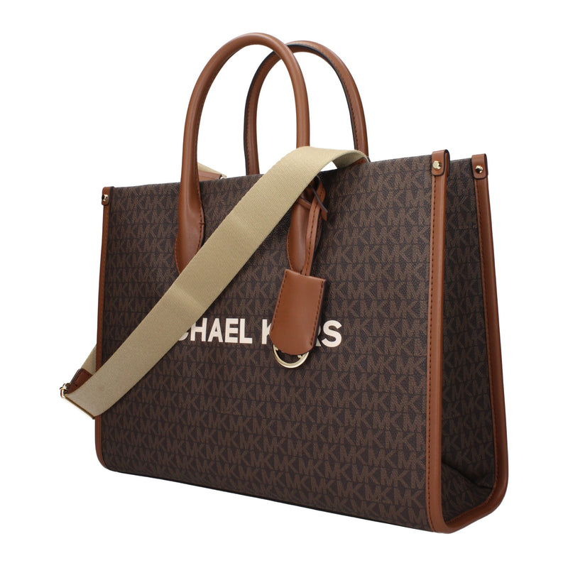 Brown monogram print fabric tote bag with brown leather trim, dual top handles, and a beige shoulder strap