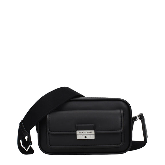 Black leather crossbody bag with a wide strap and front pocket