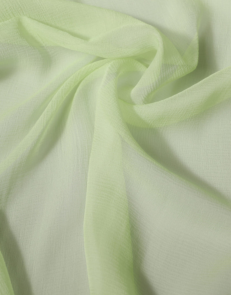 Light green silk chiffon stole draped softly