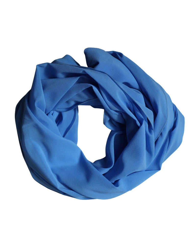 Blue silk scarf wrapped in a circular shape