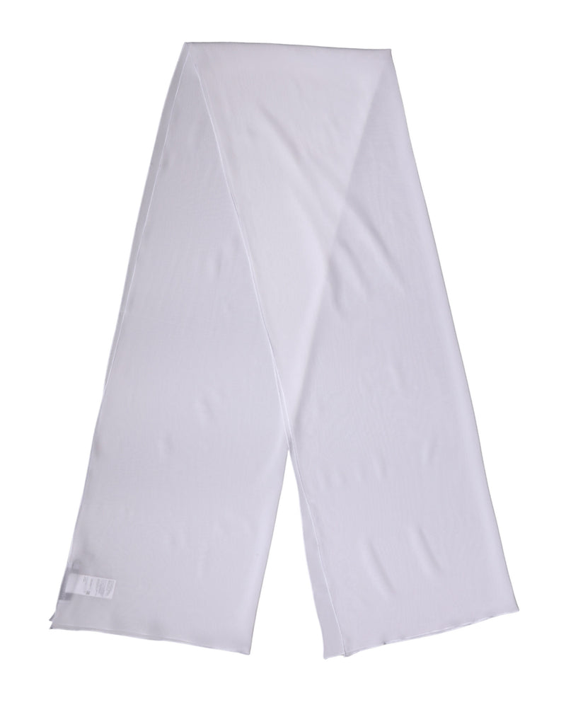 Long white silk scarf folded on a plain surface