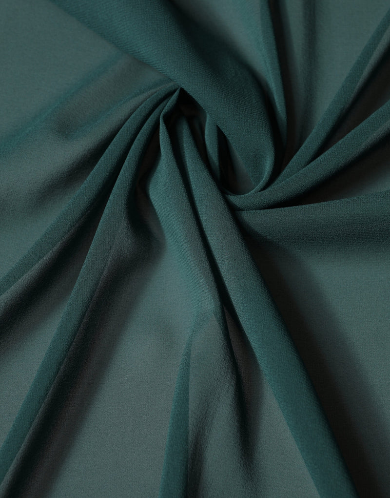 Dark green silk scarf shawl draped softly with a textured finish