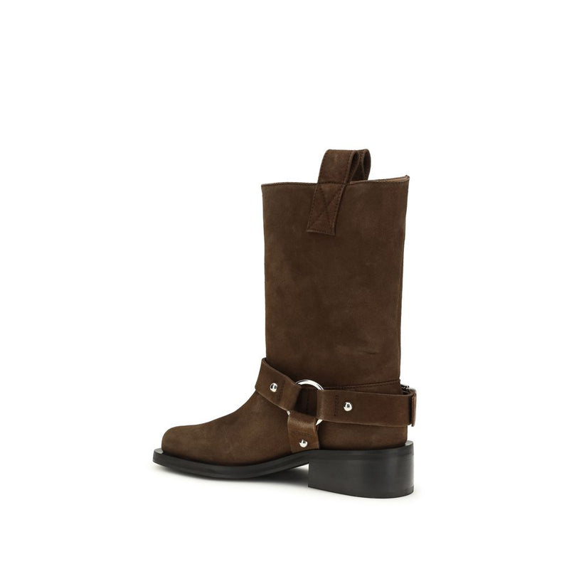 Dark brown suede mid-calf boots with a silver-toned metal ring, buckled ankle strap, and black stacked block heel.