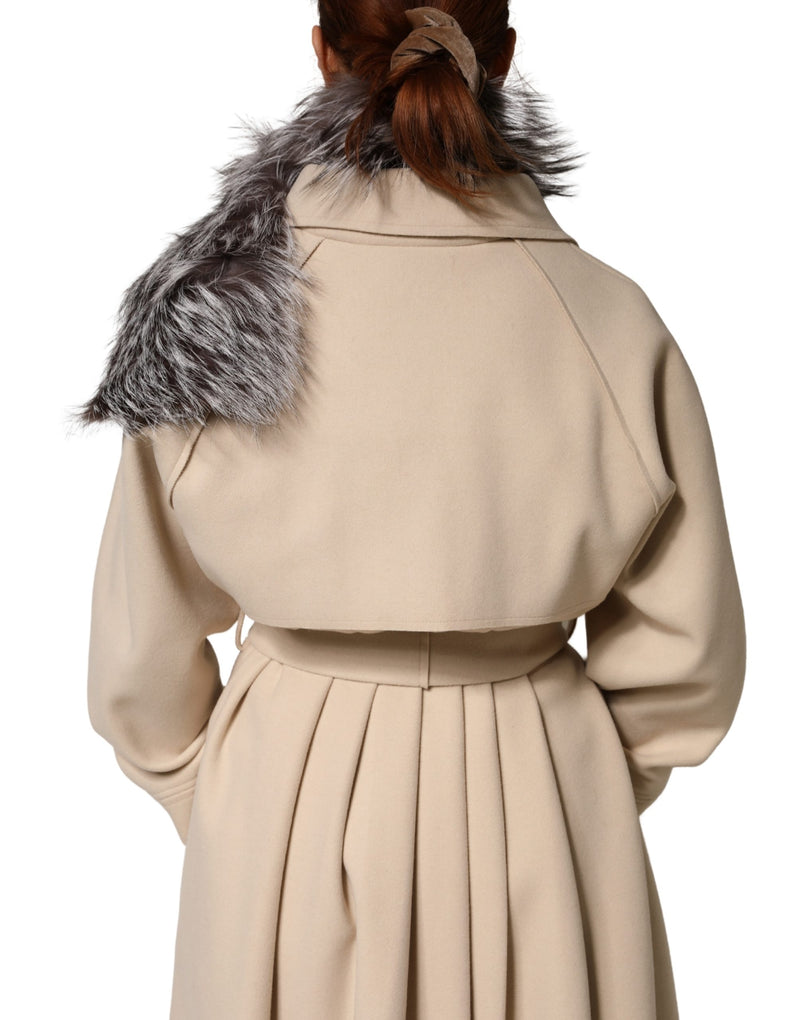Gray fox fur neck wrap and winter scarf worn over a beige coat