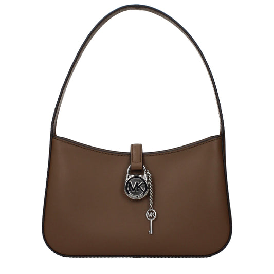 Brown leather shoulder handbag featuring a silver MK logo lock and key charm