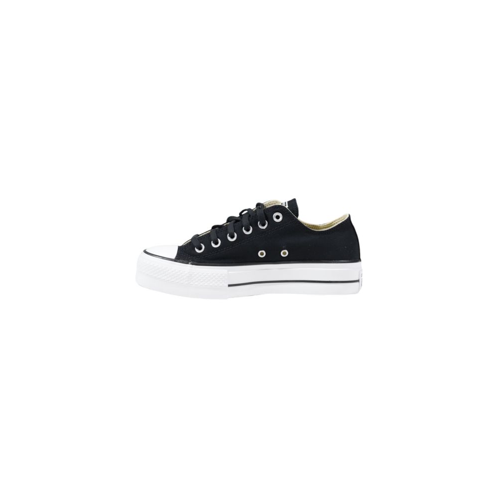 Black sneaker with white sole on a white background
