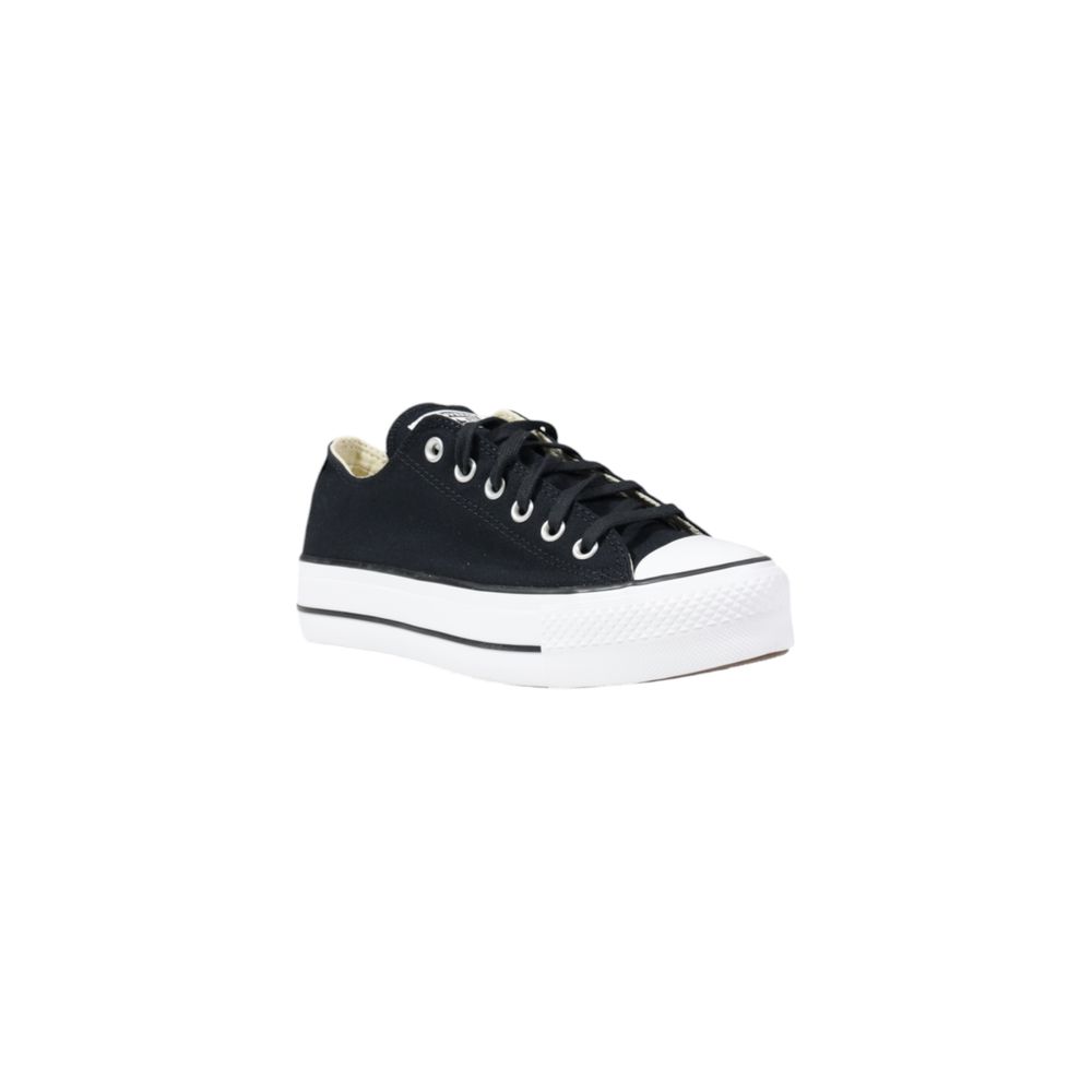 Black sneaker with a white sole on a white background