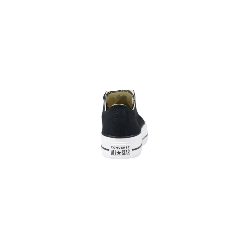 Black Converse sneaker on a white background