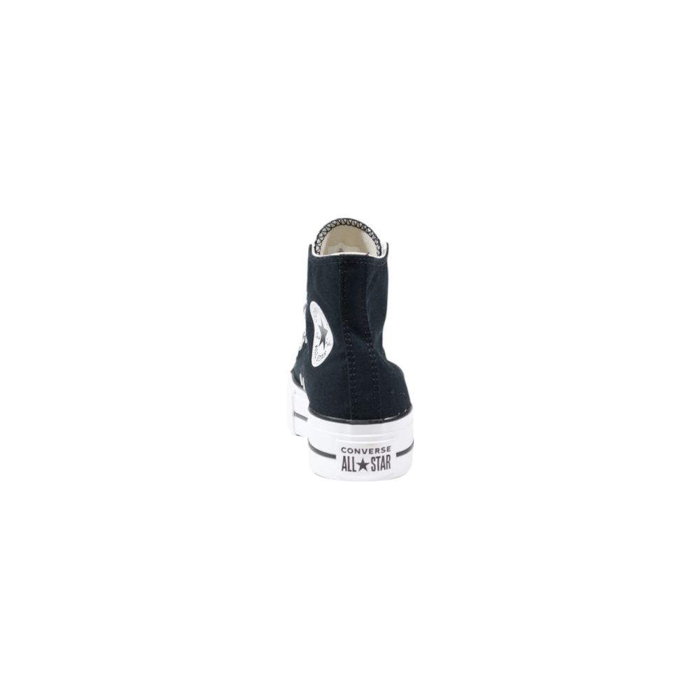 Black high-top sneaker with white sole on a white background
