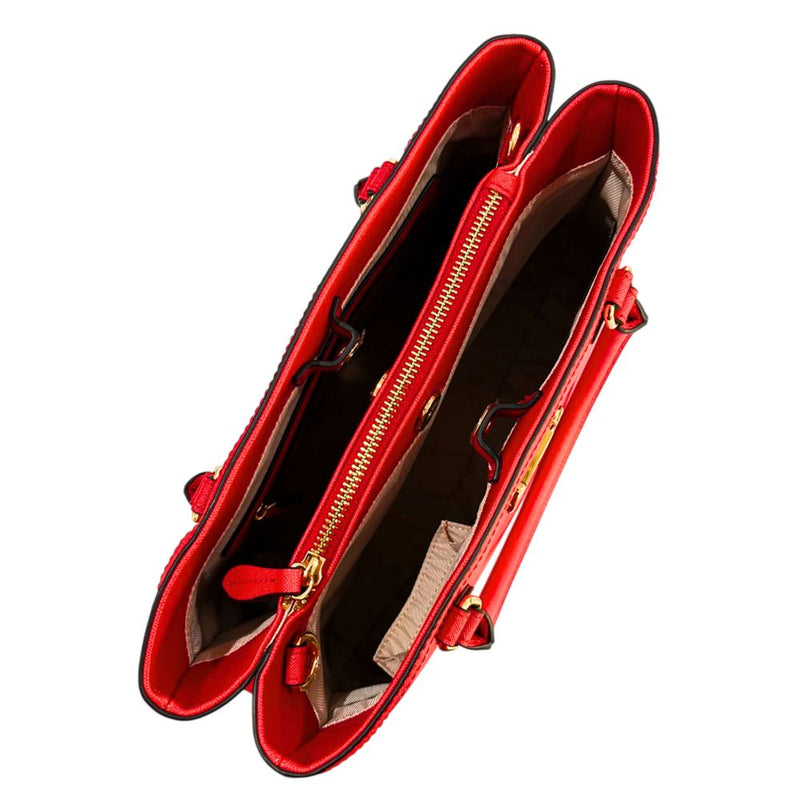 Top view of a red PU women handbag with multiple compartments and a center zip pocket