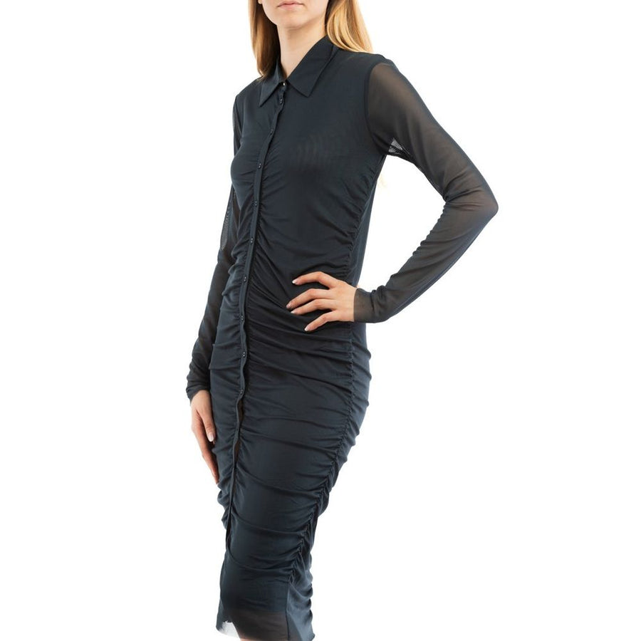 Dark blue ruched midi shirt dress in sheer polyester with long sleeves and a button-down front worn with black boots
