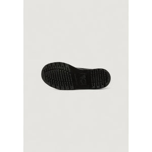 Black Dr. Martens boot showing the textured rubber sole with signature tread pattern and brand logo.